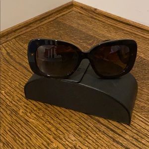 Prada tortoise shell sunglasses.
